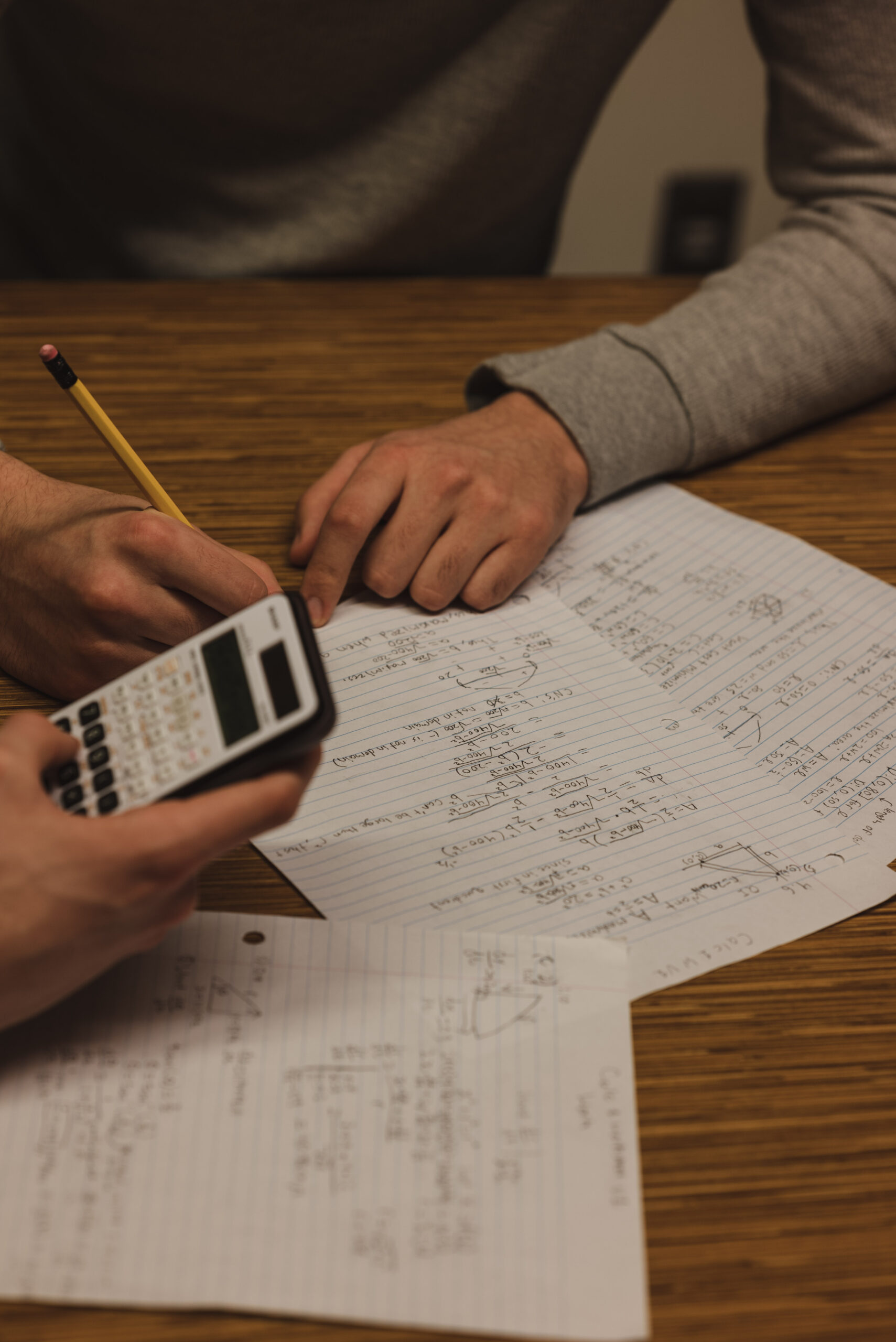 A Rising Stars tutor working through a problem with a student